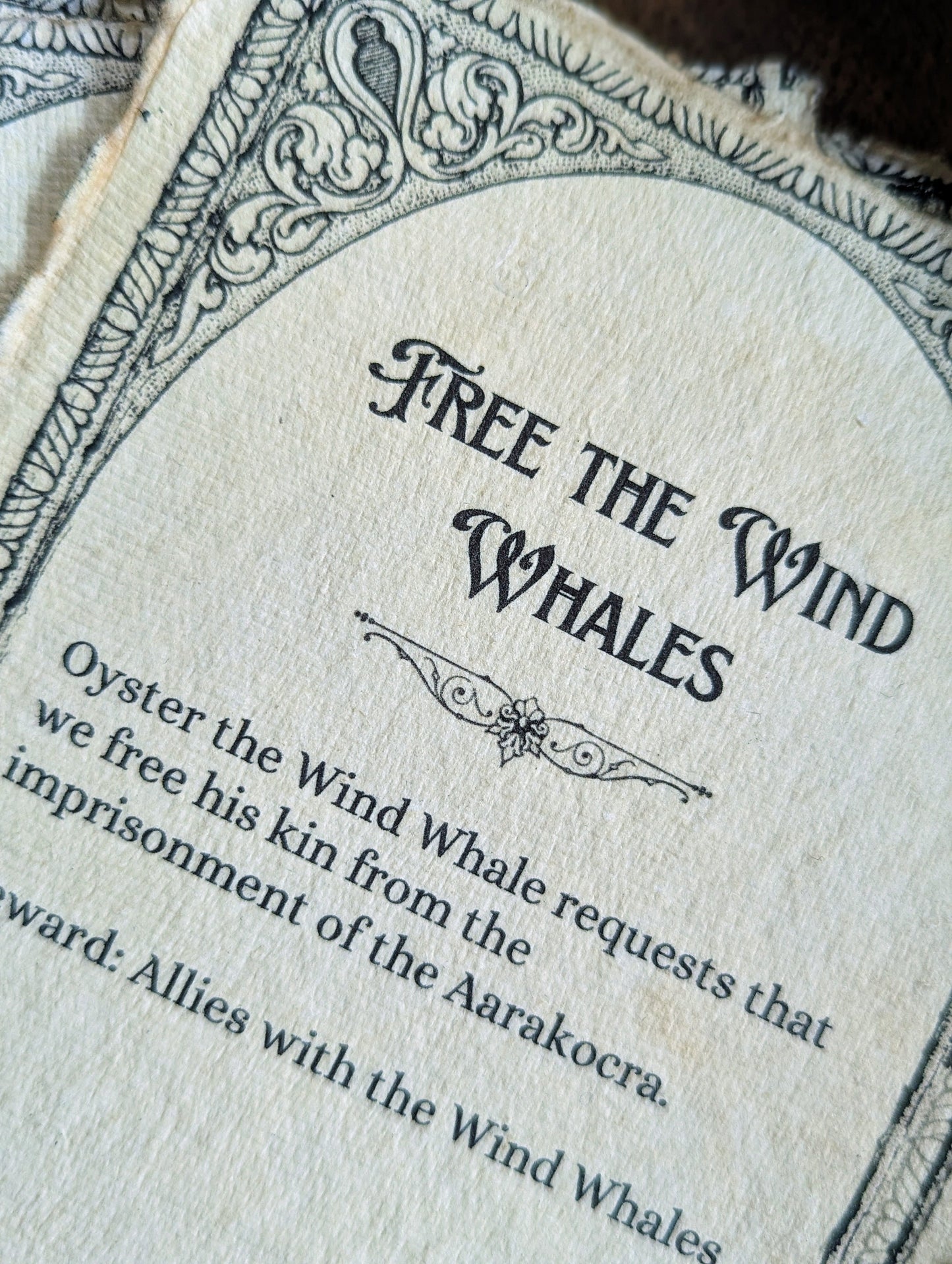 Very close zoom of ttrpg quest cards