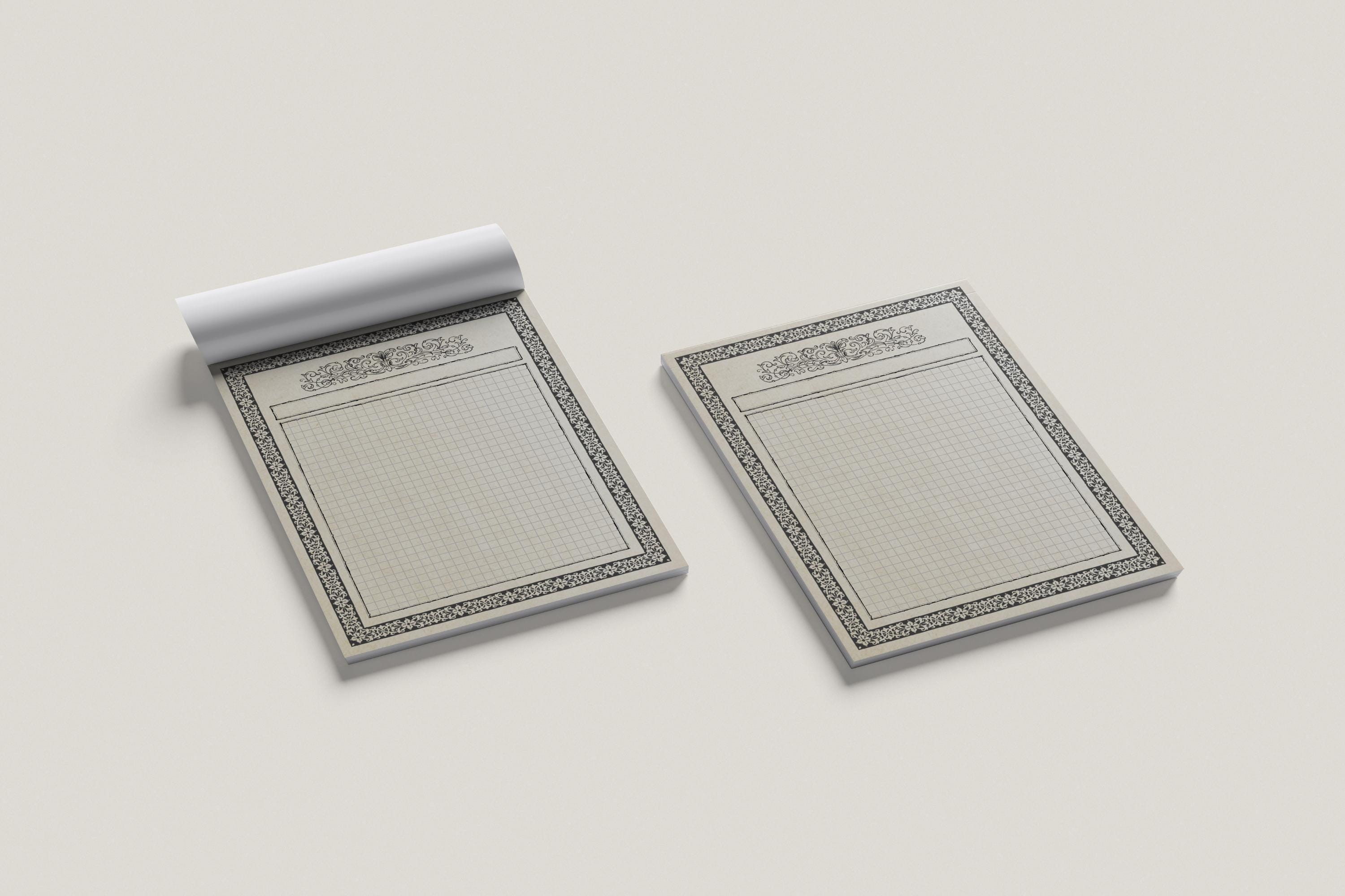 Two map pads with decorative edges on a light gray background