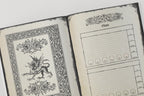 Open notebook with decorative pages and a layout for dnd stats