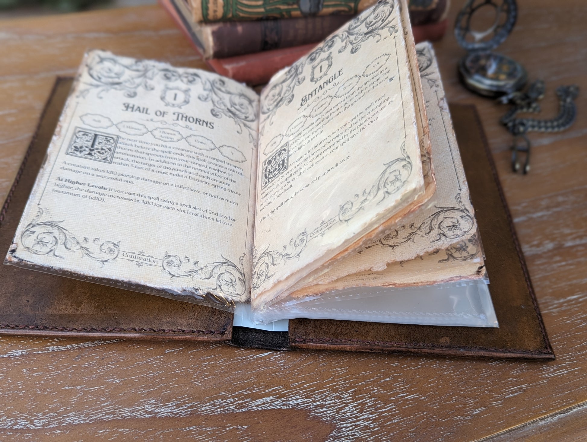 side view of open pages of a dnd leather spellbook