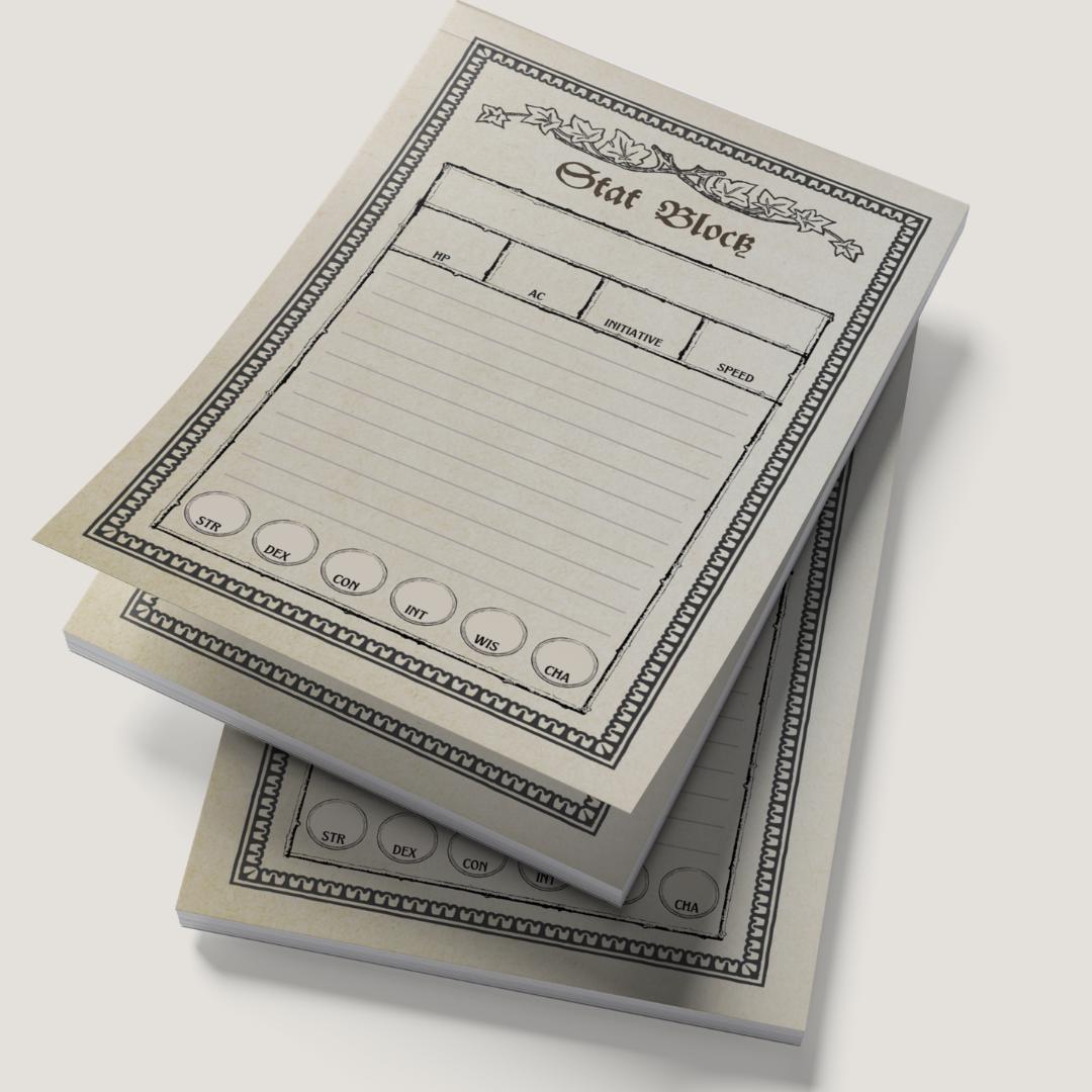 Stack of 'Stat Block' note pads on a white background