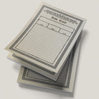 Stack of item card pads on a light gray background