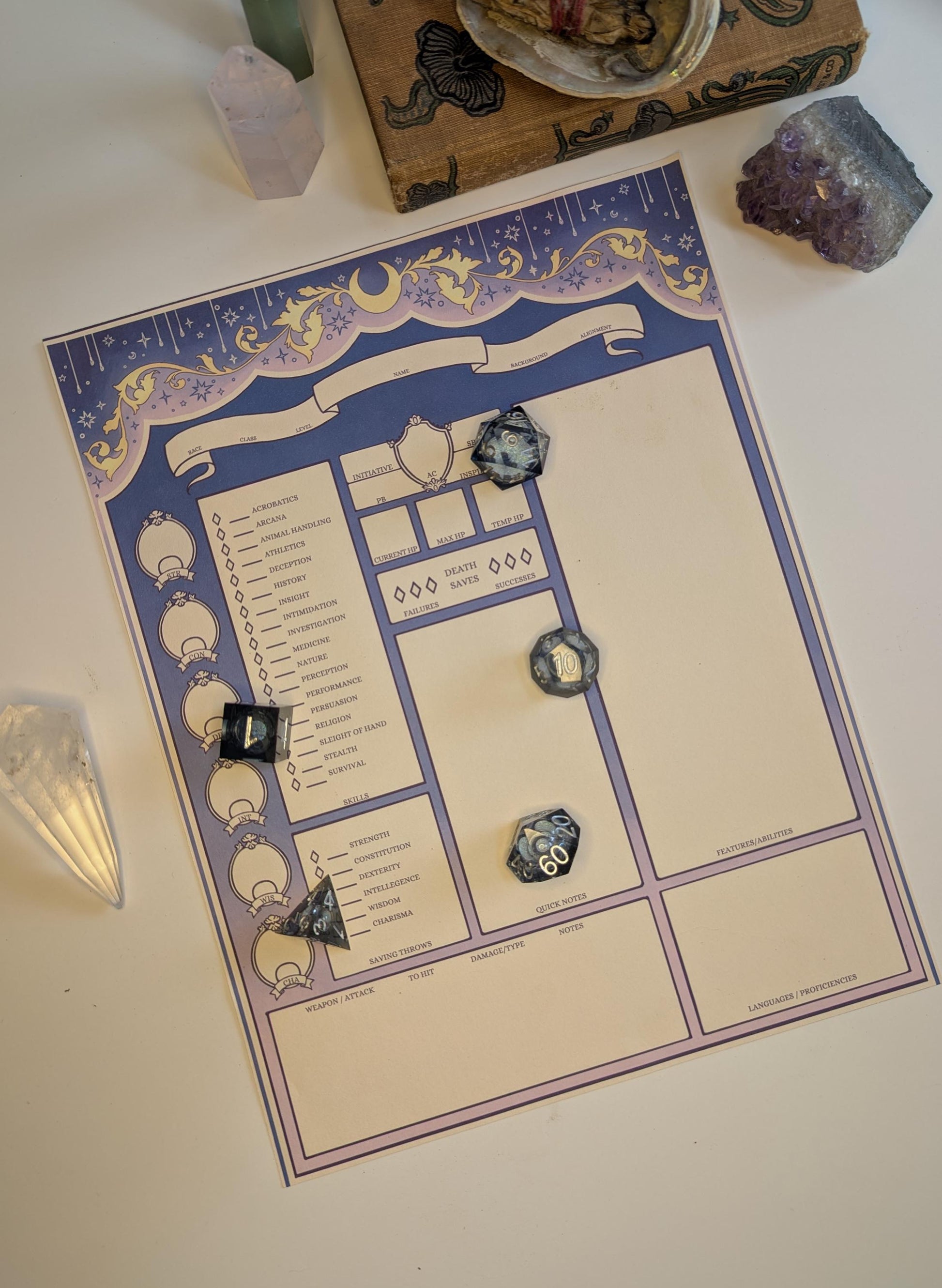 Decorative dnd character sheet with celestial design on a white surface.