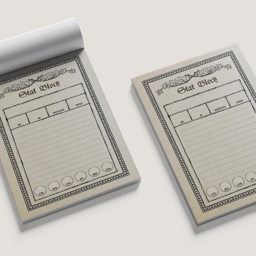 Two notepads with 'Stat Block' design on a white background