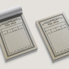 Two notepads with 'Stat Block' design on a white background